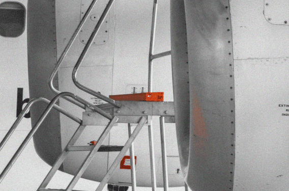 Overhead view of technicians at work on a plant floor