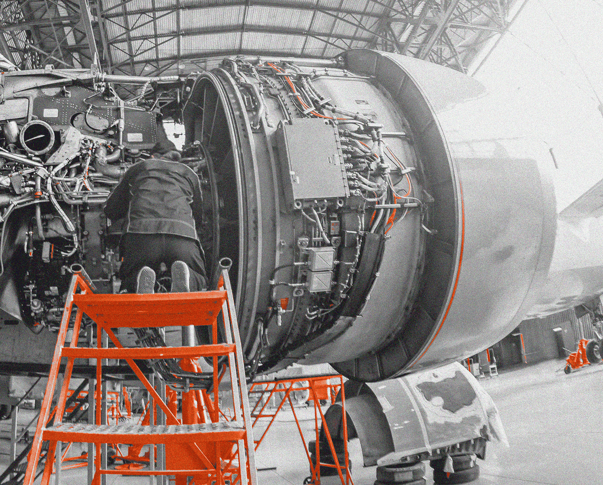 Robotic arms on an IFS-managed production line