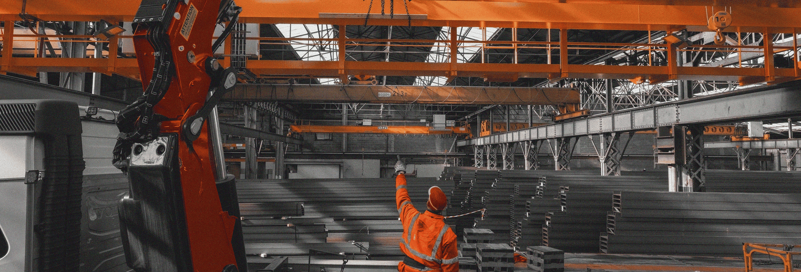 Robotic arms on an IFS-managed production line