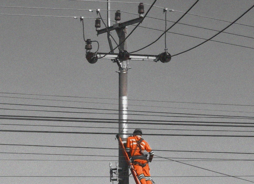 Technician working on a telecom tower