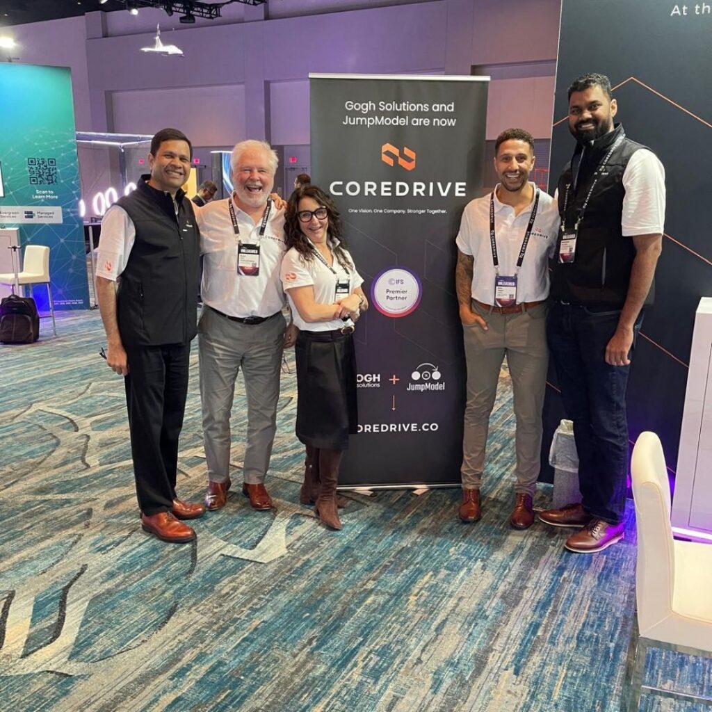 The Coredrive team at the Coredrive booth at IFS Unleashed 2026 in Orlando